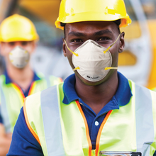 Load image into Gallery viewer, construction workers wearing protex n95 respirator