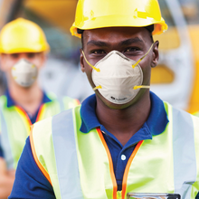 Load image into Gallery viewer, construction workers wearing protex n95 respirator
